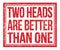 TWO HEADS ARE BETTER THAN ONE, text on red grungy stamp sign