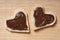 Two heart shaped bread slices with chocolate