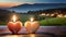 Two heart-shaped candles, placed on a table, behind a countryside landscape at night