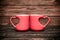 Two heart shaped mugs with tea