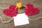 Two Hearts on burlap Background. Wedding Love Concept
