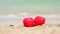 Two Hearts couple lover symbol on honeymoon day trip in tropical paradise island with banner copy space. Romantic red hearts objec