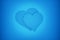 Two hearts symbol of love, abstract blue background, toning