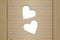 Two hearts in a wooden board