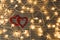 Two hearts with yellow lights, cozy couple concept, Valentine`s Day