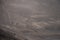 Two hikers on the Volcanic landscape during ash storm on the Fimmvorduhals hiking trail. Iceland