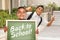 Two Hispanic Boys Giving Thumbs Up Holding Back to School Chalk Board