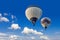 Two hot air balloons flying in sunsrise sky Cappadocia