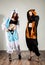 Two hot woman in funny outfit have fun in the studio