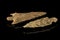 Two Indian arrowheads and black background