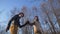 Two Indian and European boys learn to skate on a frozen lake and play mischief.