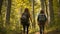 Two individuals hiking through the forest while carrying backpacks on their backs, Friends hiking with backpacks and hiking poles