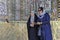 Two islamic women make selfie in courtyard of the mosque.