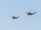 Two Israeli combat helicopters participate in an air parade dedicated to the 70th anniversary of of the Independence of Israel