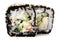 Two Japanese square rolls with black tobiko roe, sesame seeds an