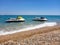 Two jet skis on the beautiful Skala beach of Kefalonia island, Ionian sea, Greece