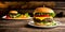 Two juicy cheeseburgers close-up on a wooden table on a kitchen board against a background of a blurred rustic