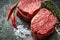 Two juicy filet Mignon beef steaks prepared for grilling