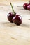 Two juicy healthy ripe red cherries