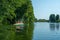 Two kayaks with a group of several people rowing. Rafting on the fast river. Adventure traveling lifestyle. Concept wanderlust.