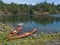 Two kayaks on rocky shore