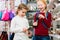 Two kids buying toys in toy store