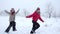 Two kids running together on winter landscape, slow motion