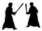 Two kids sword fighting duel in medieval style costumes