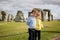 Two kids, visiting Stonehenge