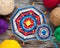 Two knitted tibetan mandala from threads and yarn