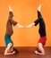 Two Ladies in Yoga Head Stands