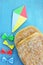 Two lagana breads and colorful kite
