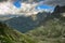 Two lakes hidden high in mountain in between rocky peaks