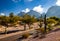 Two Lane Street in Desert Mountains Surrounded by Saguaros