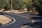 Two lane, winding paved country road in southern califonia