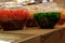 Two large bowls of glace fruits on a table