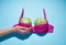 Two large cabbage in a black bra