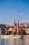 Two large Catholic churches on the Danube River in Budapest.