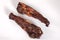 Two large dried oxtails. Could be used in exotic cuisine or as natural chew treats for big dogs.