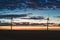 Two large windmills on the shore of the lake Markermeer during sunrise