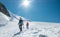 Two laughing young women Rope team descending Mont blanc du Tacul summit 4248m dressed mountaineering clothes with ice axes