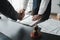 Two lawyers shake hands in a brainstorming meeting. Lawyers search for legal information together to plan how to represent clients