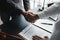 Two lawyers shake hands in a brainstorming meeting. Lawyers search for legal information together to plan how to represent clients