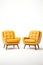 Two leather armchairs in light environment. Minimal design with empty space for photo manipulation. Generative Ai image