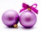 Two lilac christmas balls with ribbon isolated