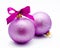 Two lilac christmas balls with ribbon isolated