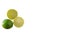 Two lime halves and a whole lime isolated on a white background