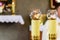 Two lit candles, catholic church mass