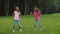 Two little african sisters dancing hip hop in park