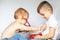 Two little boys using stethoscope. Children playing doctor and patient. Check the heartbeat.